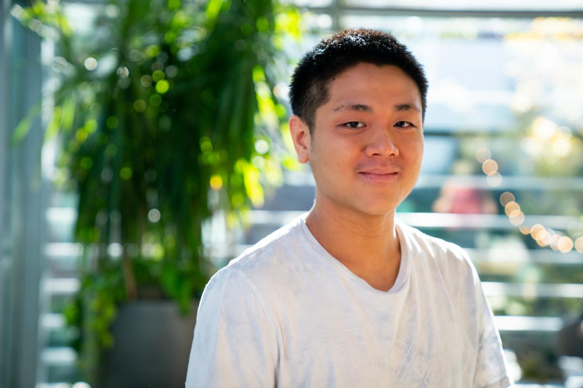 Short haired man in white T-Shirt