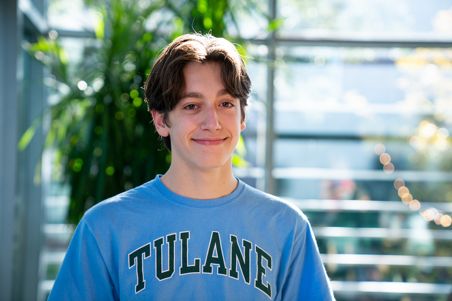 Man in blue Tulane shirt